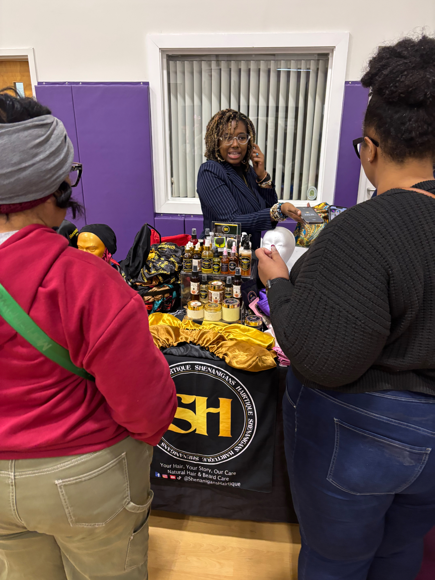 Natural hair and beard care vendor connecting with customers